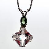 Danburite Mini Magician Stone™ with Oval Cut Moldavite